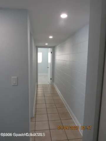 a bathroom with a toilet and a bath tub