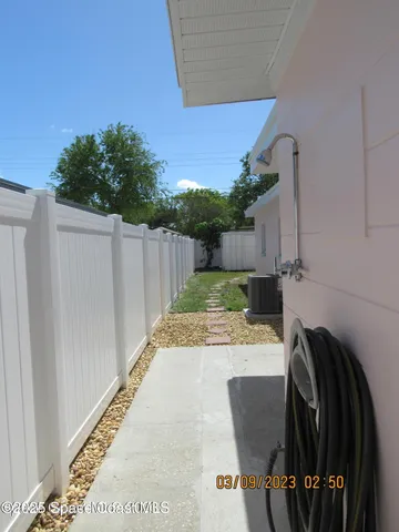 a view of stairs gate of a house