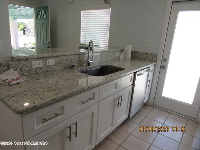 a view of a kitchen cabinets