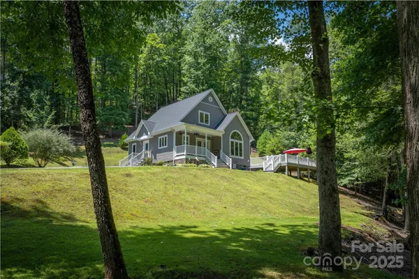 a front view of a house with yard