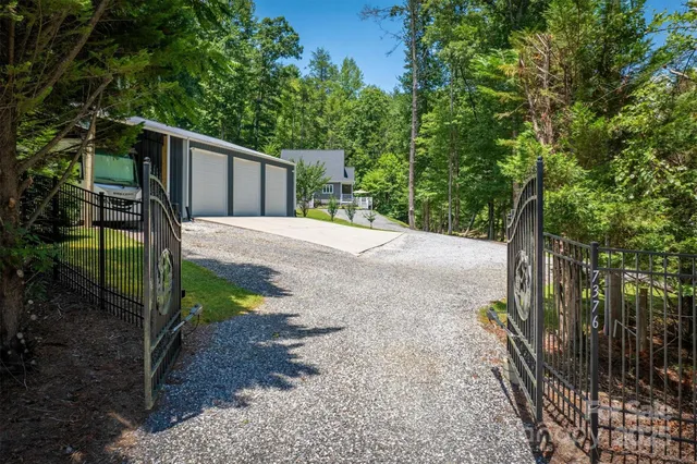 a pathway of a house with a yard