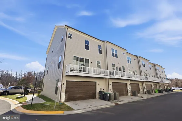 a large white building with a view of street