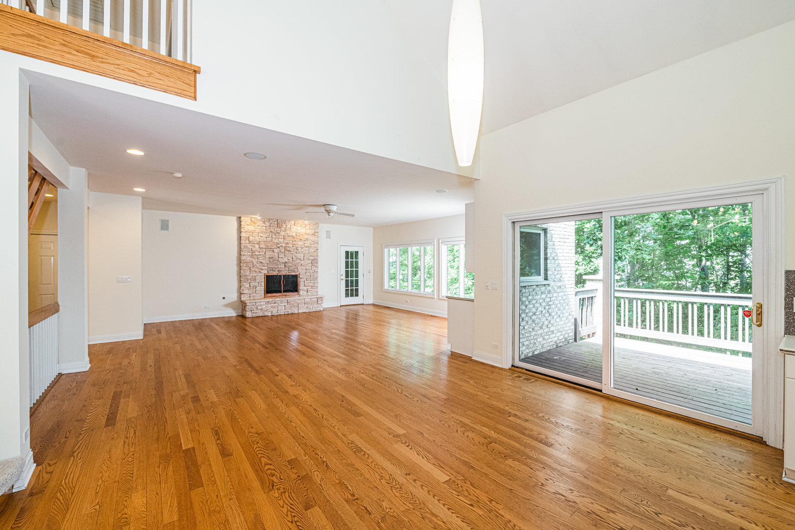 1071 Bonner Road Wauconda, IL 60084 - Photo 18 of 61 a view of an empty room with wooden floor and a window
