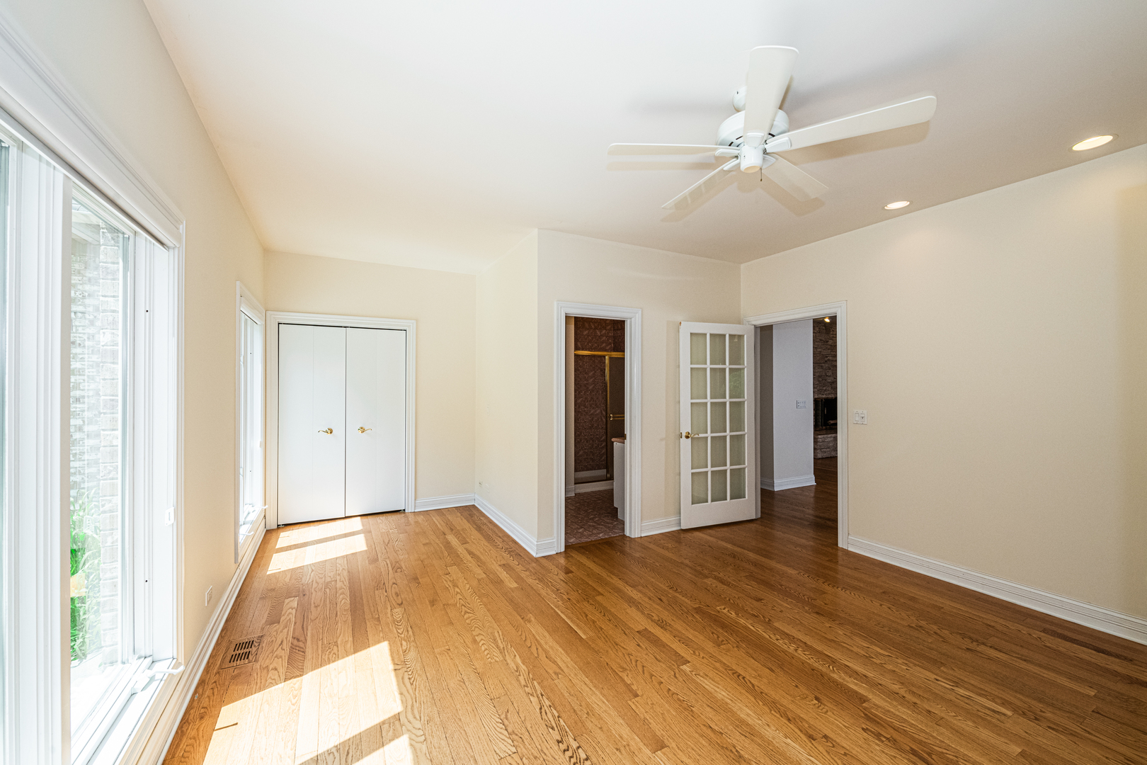 1071 Bonner Road Wauconda, IL 60084 - Photo 27 of 61 a view of an empty room with wooden floor and a window