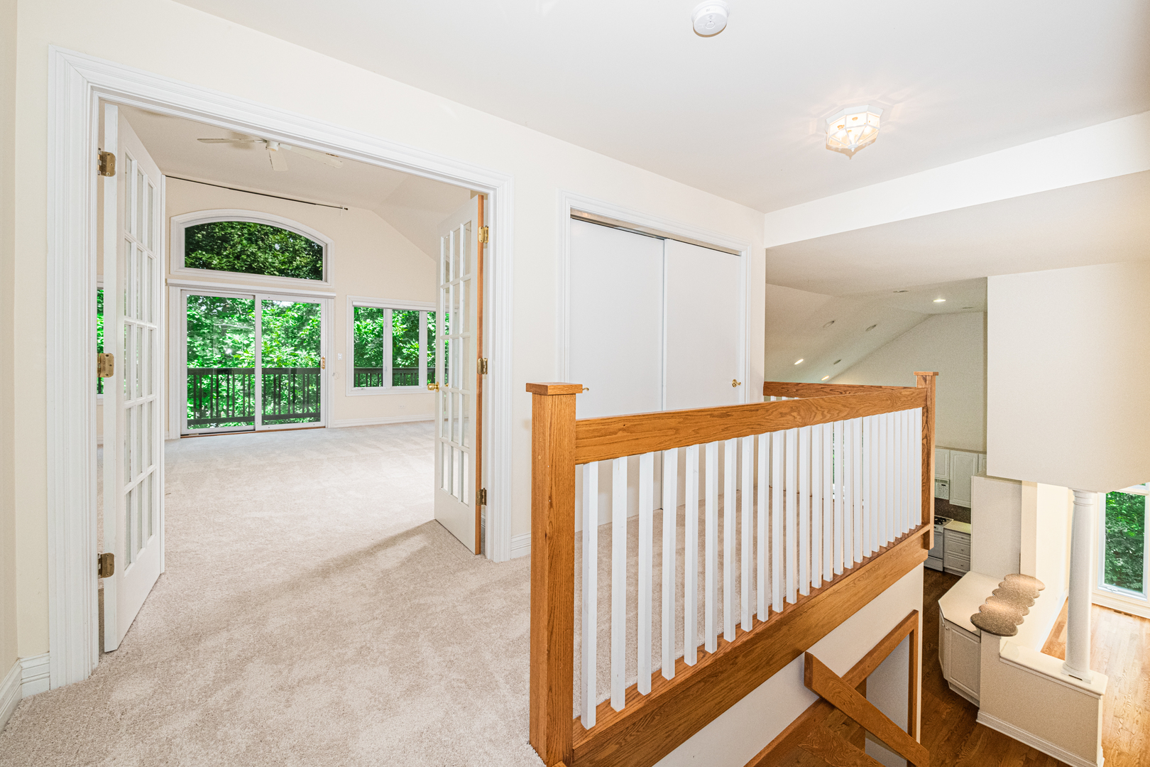 1071 Bonner Road Wauconda, IL 60084 - Photo 28 of 61 a view of a hallway with windows and stairs