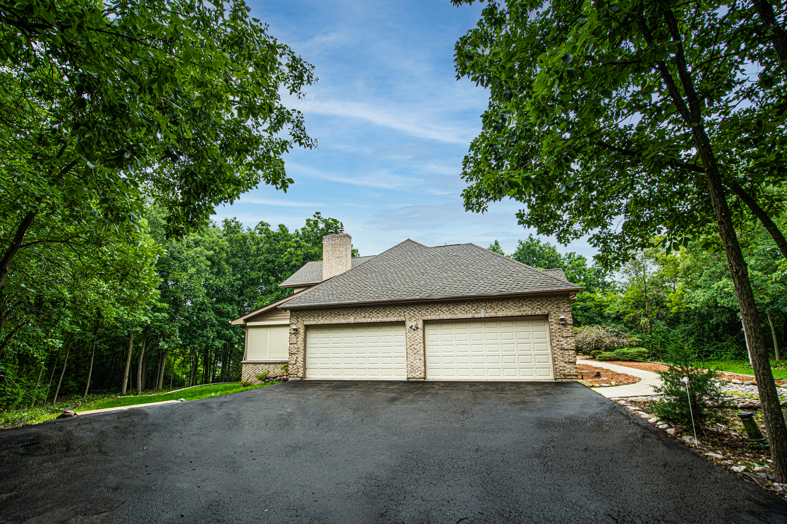 1071 Bonner Road Wauconda, IL 60084 - Photo 50 of 61 a house that has a tree in front of it