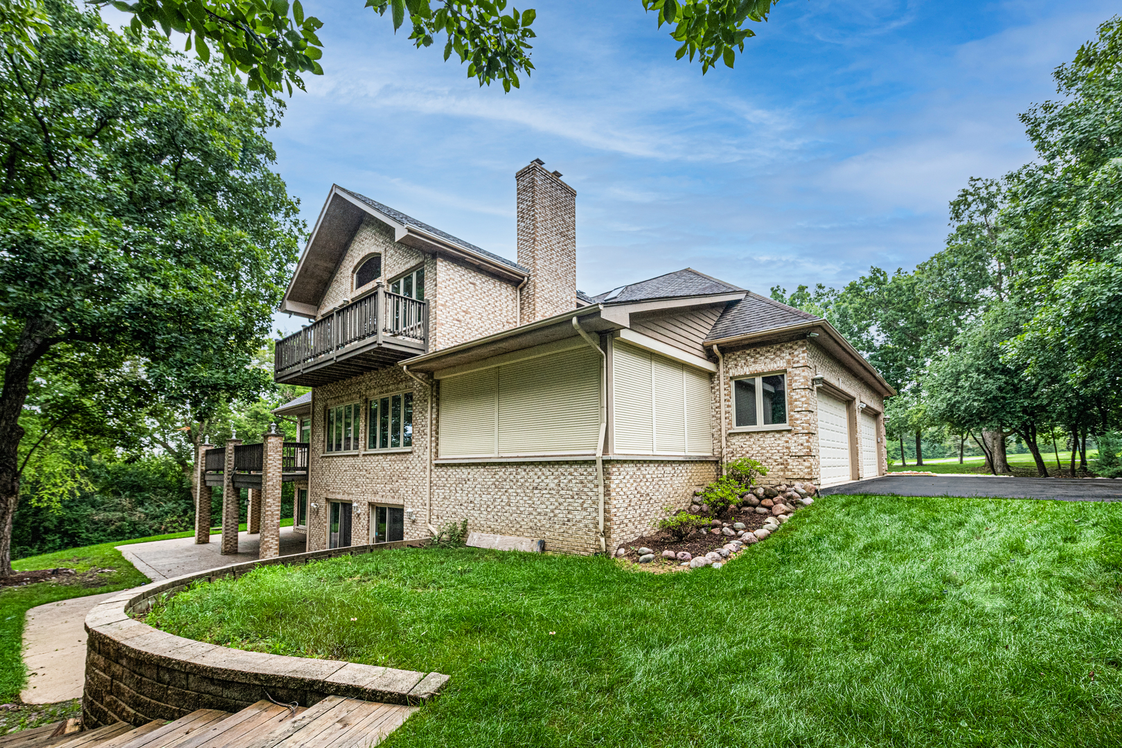 1071 Bonner Road Wauconda, IL 60084 - Photo 51 of 61 a front view of a house with garden