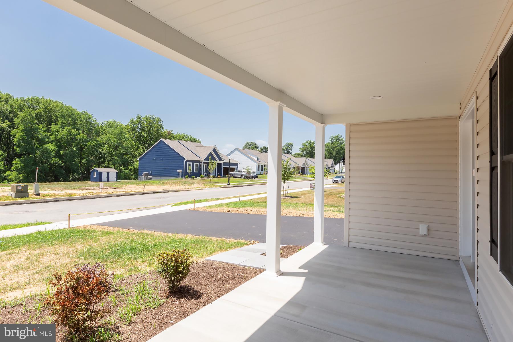 18 Ridgewood Road Quarryville, PA 17566 - Photo 11 of 13 Charming porch with scenic views.