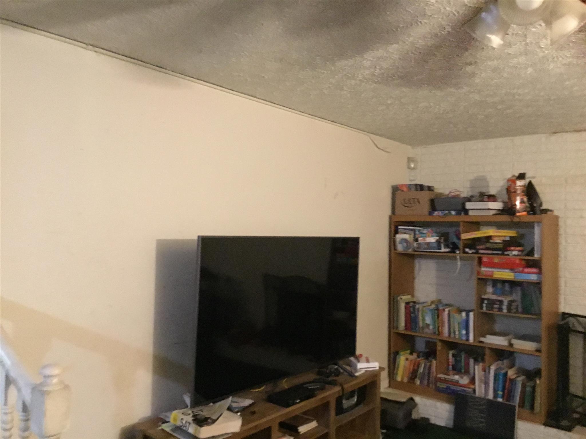 1809 South Hamilton Road Nashville, TN 37218 - Photo 5 of 15 a living room with lots of furniture and clutter