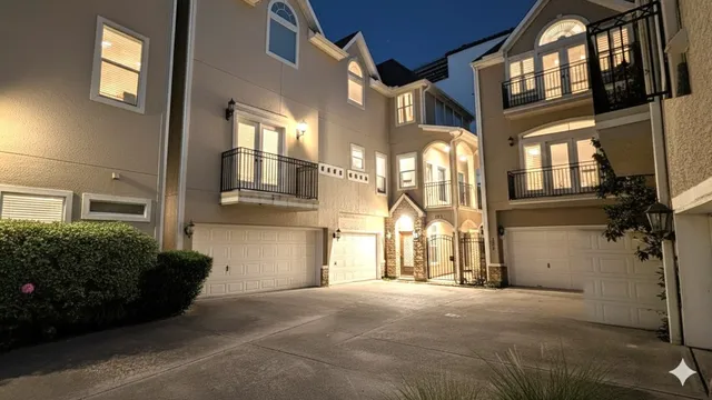 a view of a brick house with a street