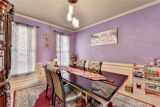 a living room with furniture fireplace and flat screen tv