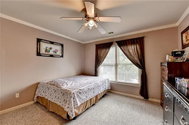a bathroom with a sink and a large mirror