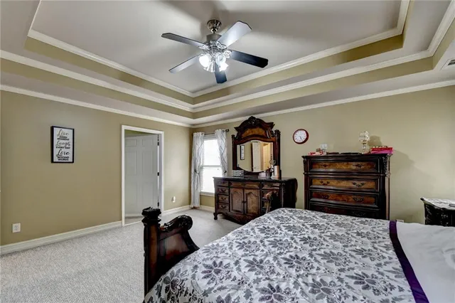 a view of a backyard with sitting area