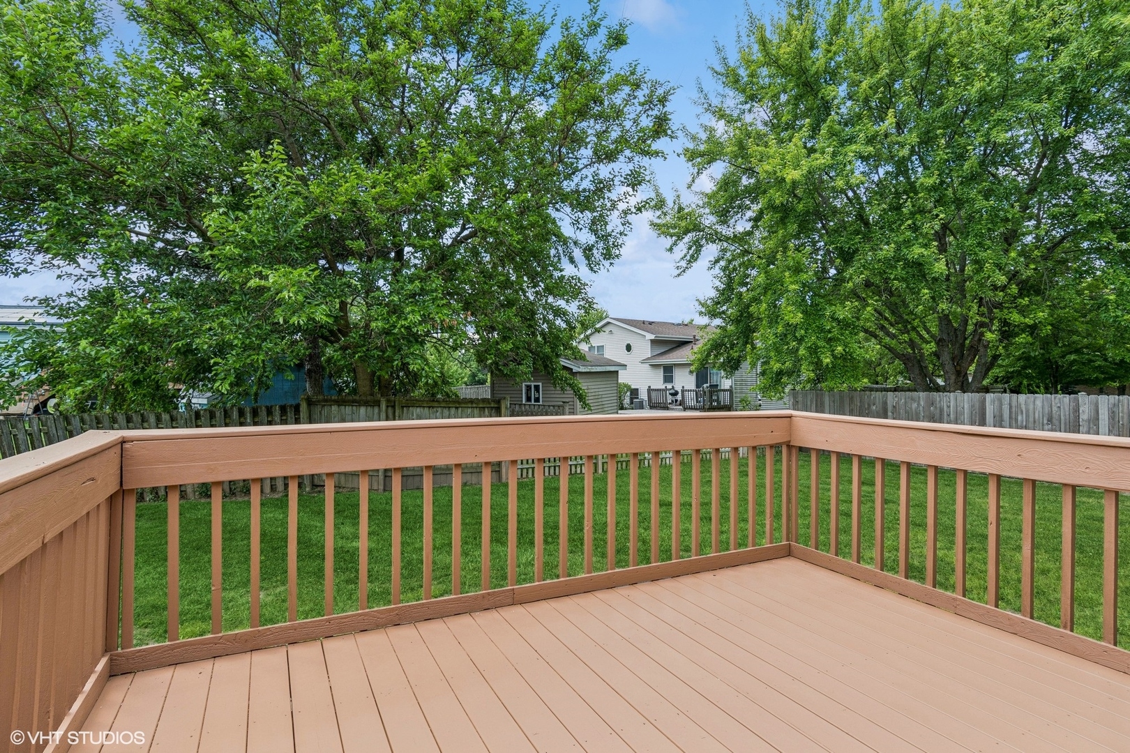 702 Amber Road New Lenox, IL 60451 - Photo 22 of 23 a view of balcony with deck and yard