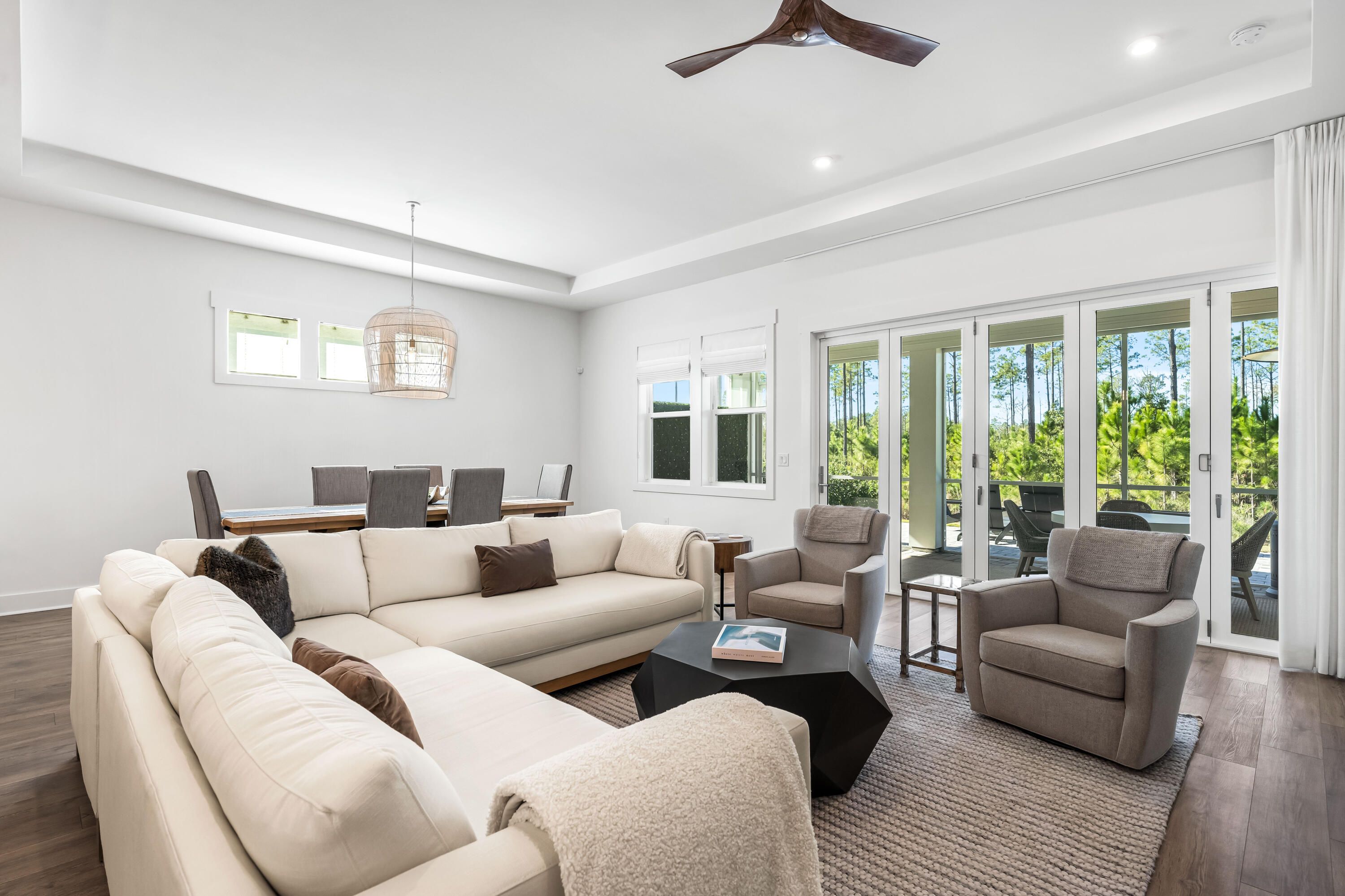 69 River Rise Way Watersound, FL 32461 - Photo 21 of 46 a living room with furniture and a large window