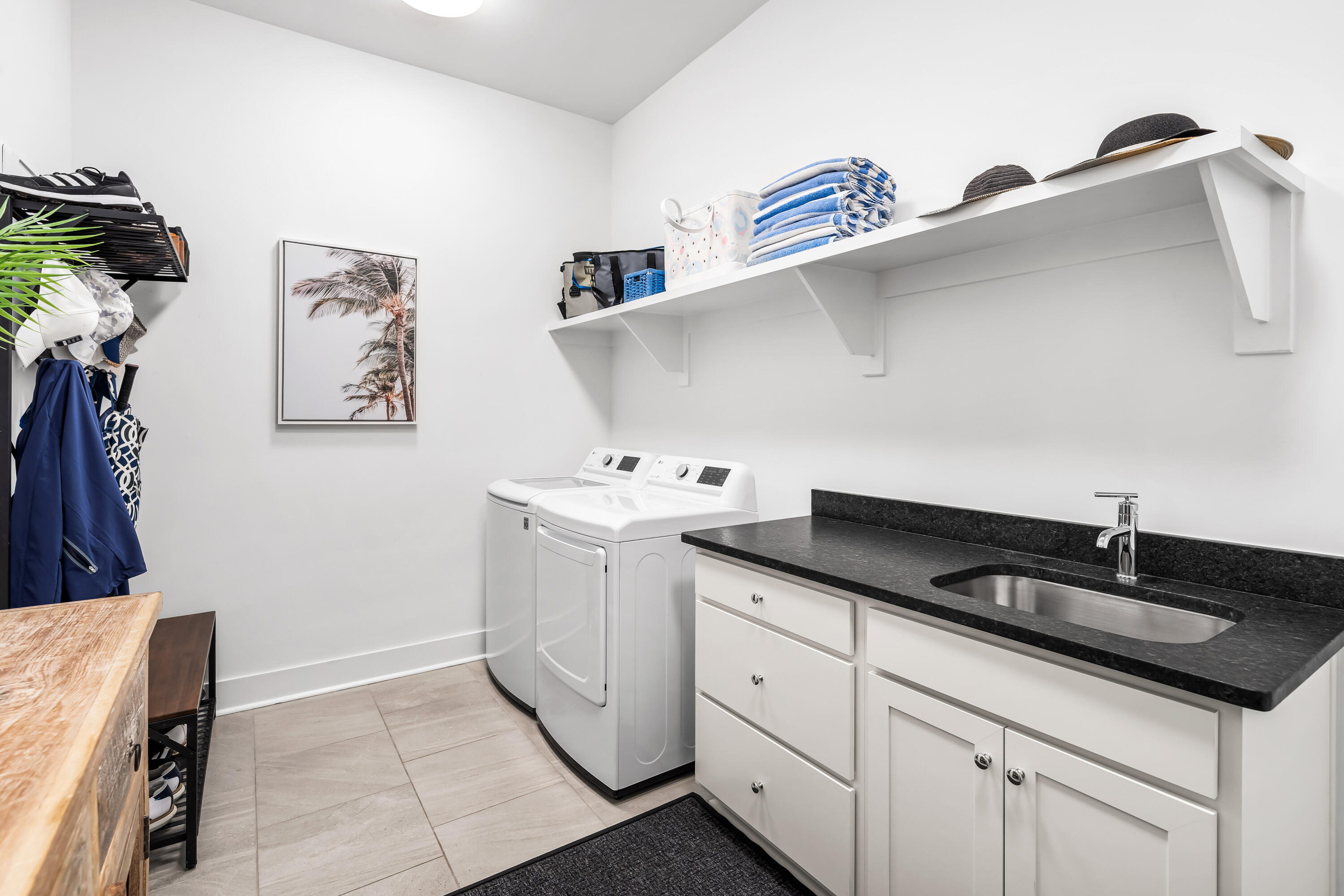 69 River Rise Way Watersound, FL 32461 - Photo 25 of 46 a utility room with cabinets
