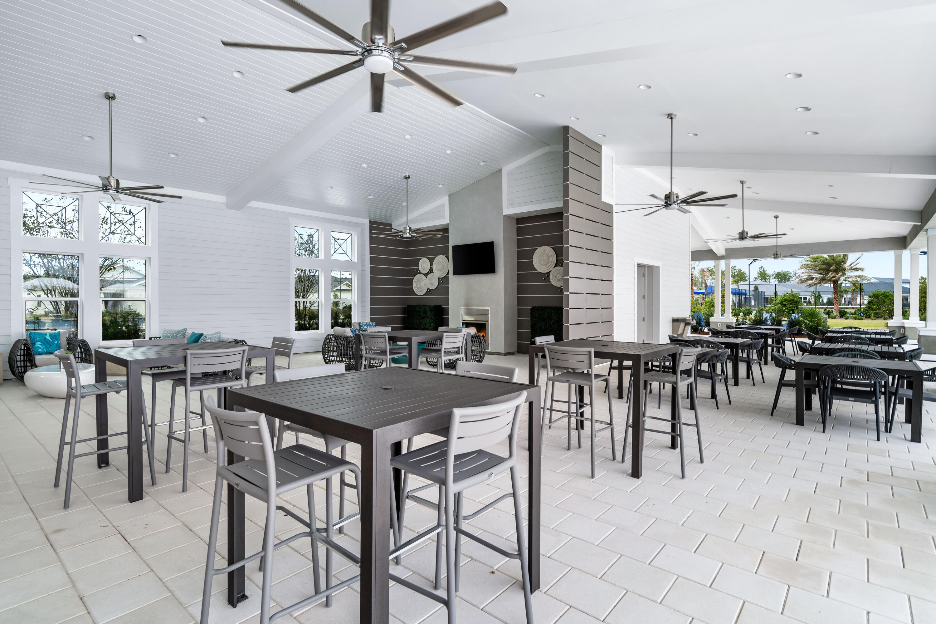 69 River Rise Way Watersound, FL 32461 - Photo 33 of 46 a view of a dining room with furniture