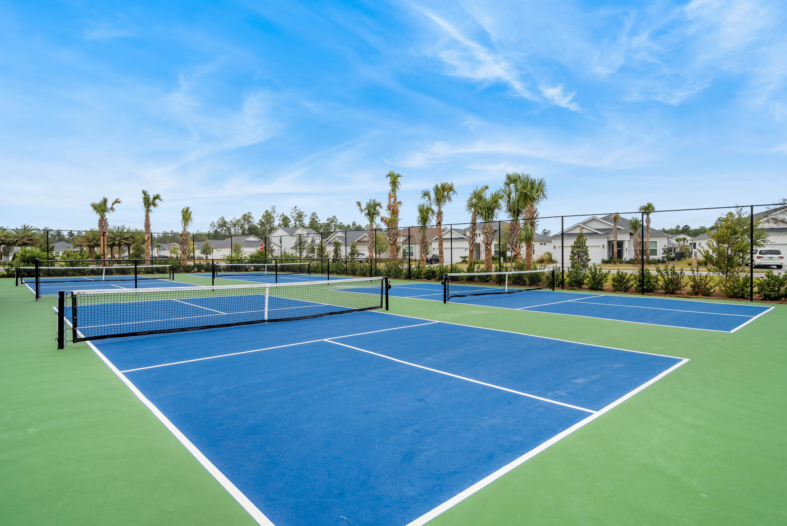 69 River Rise Way Watersound, FL 32461 - Photo 41 of 46 a view of an outdoor space and tennis court