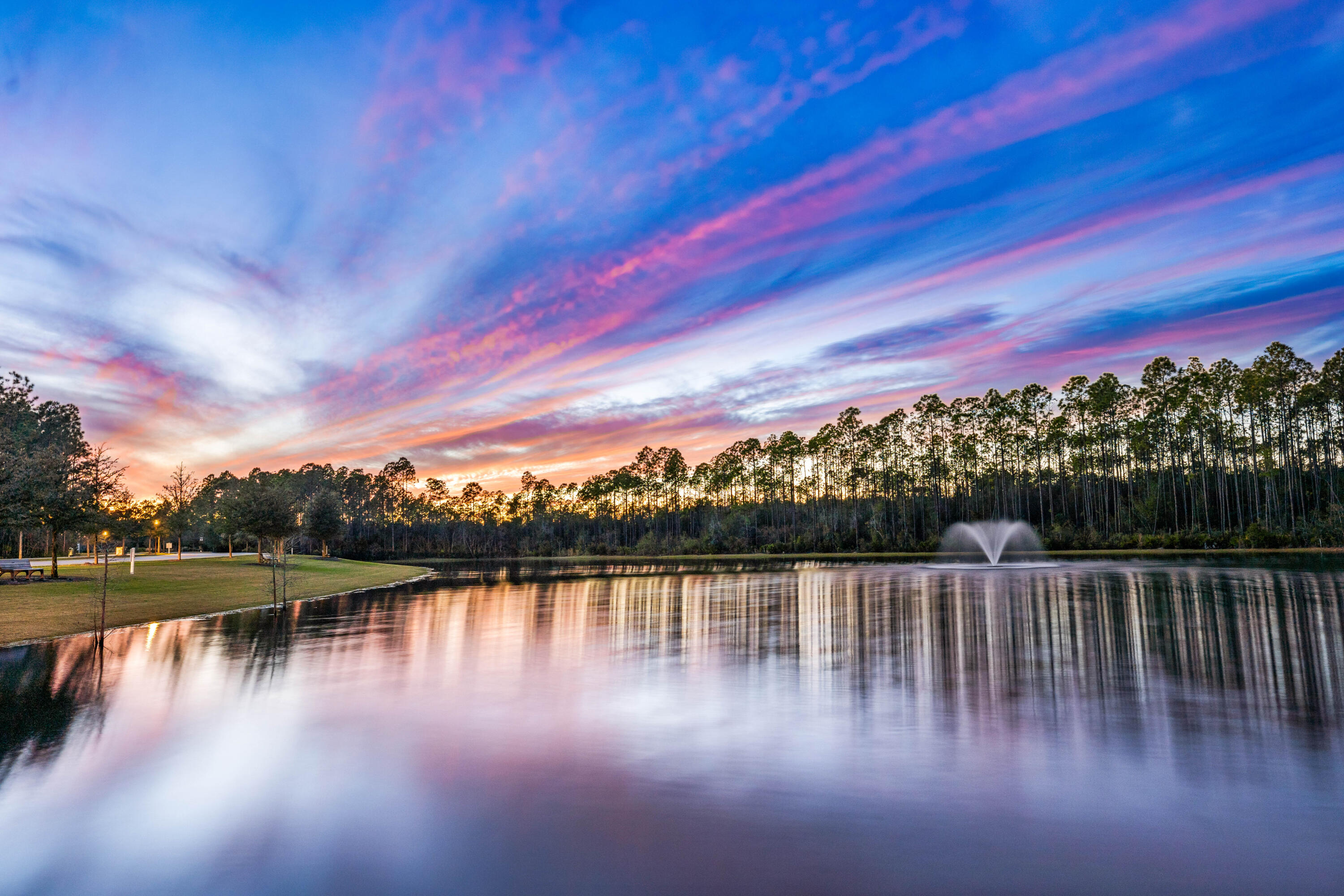 69 River Rise Way Watersound, FL 32461 - Photo 46 of 46 a view of a lake with a city