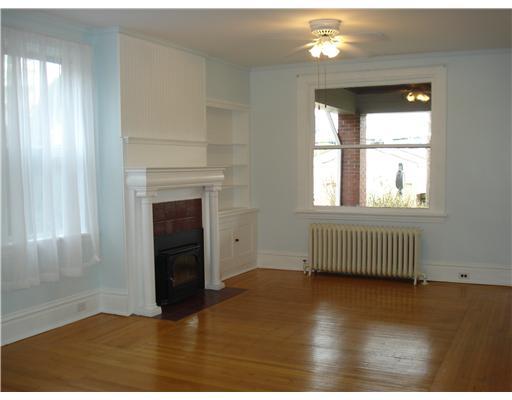 Living Room. SPACIOUS LIVING ROOM BOASTS A WORKING FIREPLACE & IS FRESHLY PAINTED. INCREDIBLE NATURAL LIGHT.