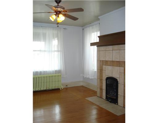 Dining Room. DINING ROOM IS COMPLEMENTED WITH A BUILT-IN CHINA HUTCH & HIGHLIGHTS A WORKING FIREPLACE. BEAUTIFUL FENESTRATION FILLS THE ROOM WITH SUNLIGHT.