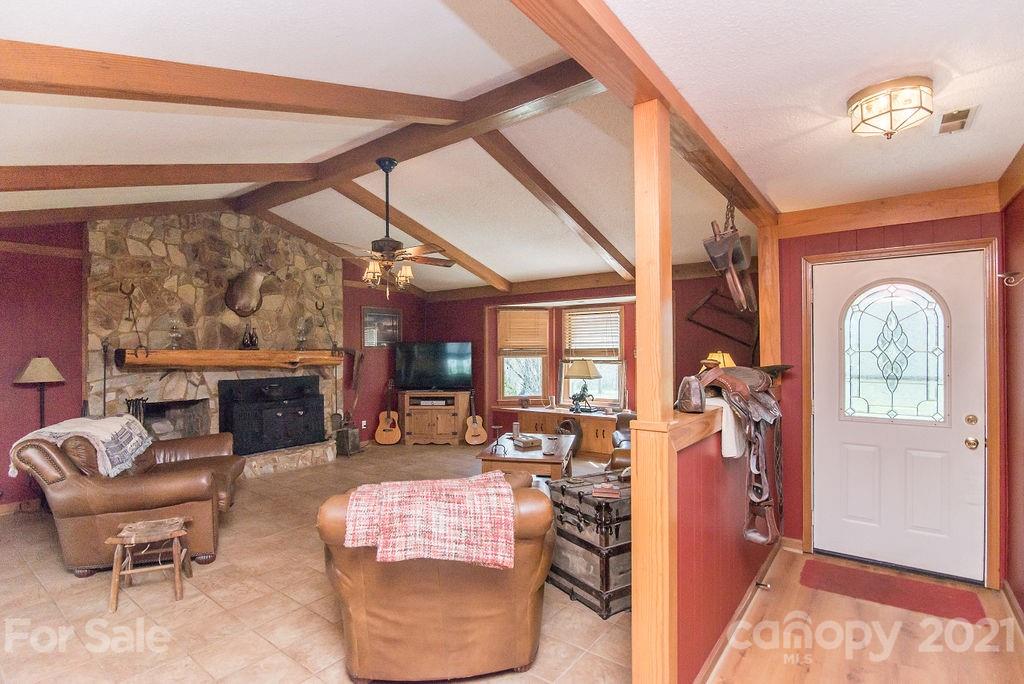 1791 Westbrook Road Edgemoor, SC 29712 - Photo 14 of 45 a living room with furniture and a fireplace