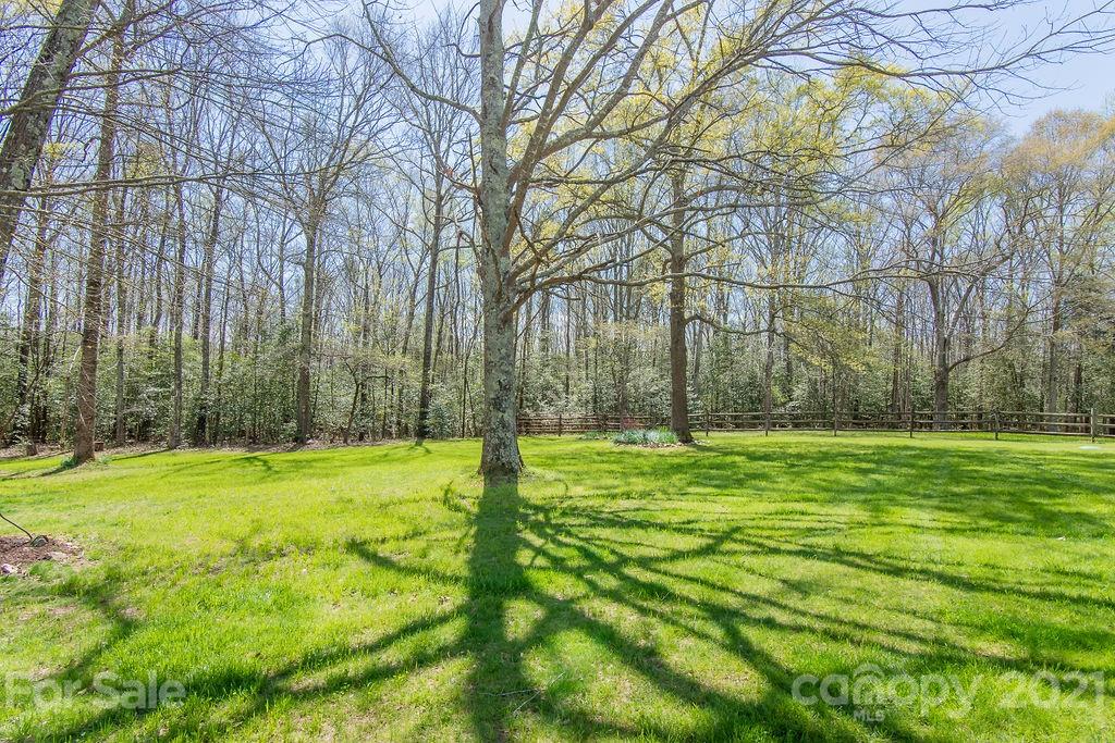 1791 Westbrook Road Edgemoor, SC 29712 - Photo 4 of 45 a backyard of apartments with large trees