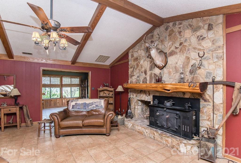 1791 Westbrook Road Edgemoor, SC 29712 - Photo 8 of 45 a living room with furniture and a fireplace