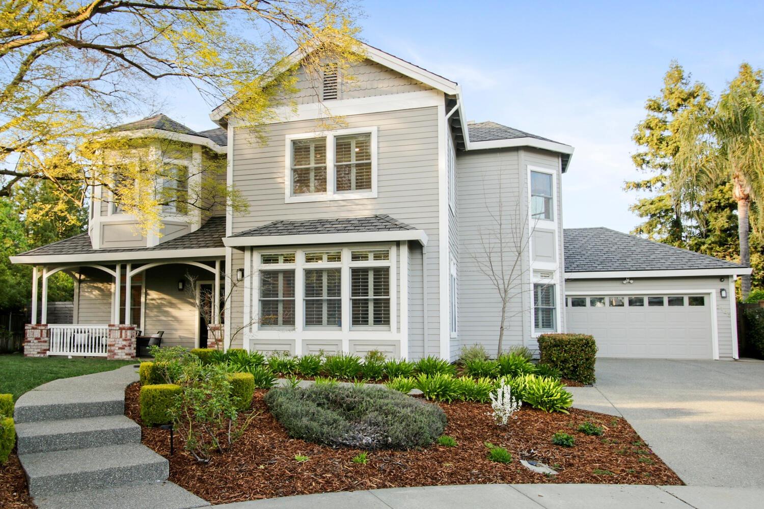 front view of a house with a yard