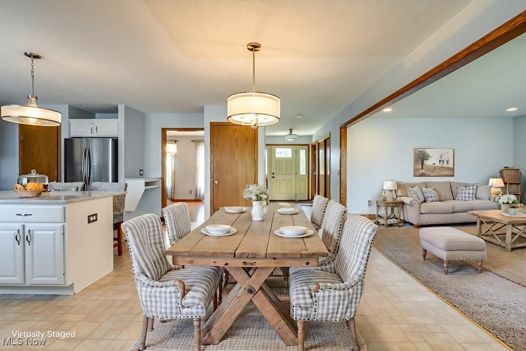 5613 Stoney Ridge Road Northwest Canton, OH 44718 - Photo 5 of 39 Dining room featuring recessed lighting