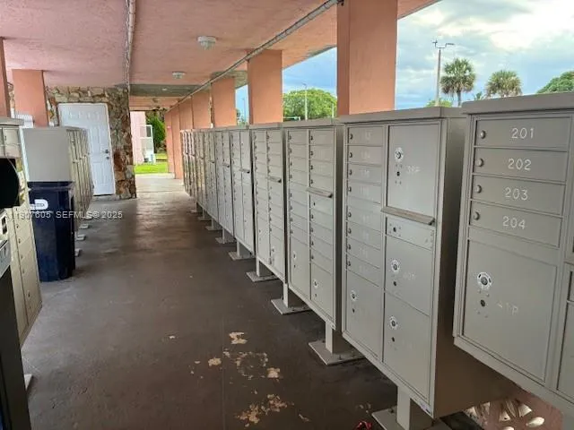 a view of a porch with wooden floor
