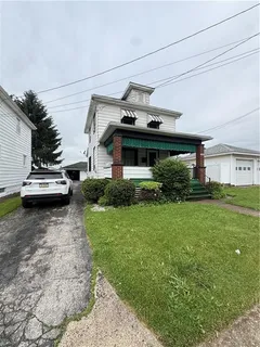 a car parked in front of a house
