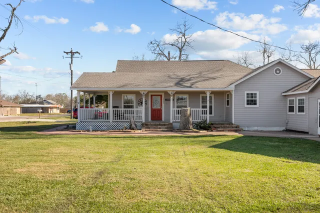a view of a swimming pool with a patio