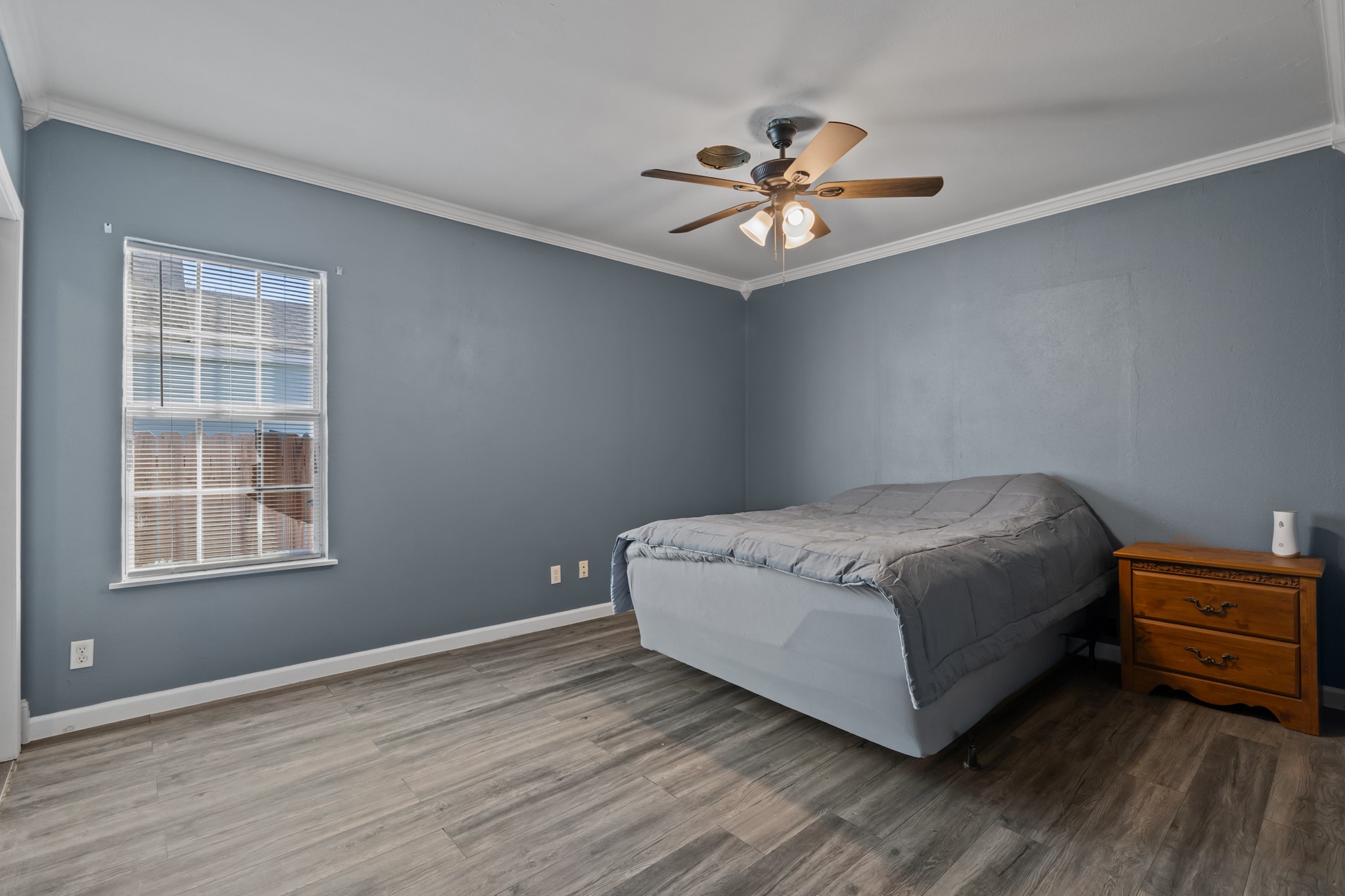 2006 Main Street Danbury, TX 77534 - Photo 16 of 30 a room with a bed and a window