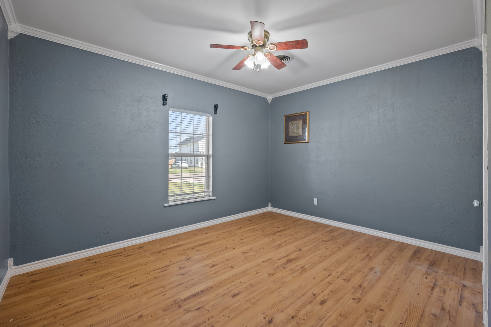 2006 Main Street Danbury, TX 77534 - Photo 24 of 30 a view of an empty room with a window