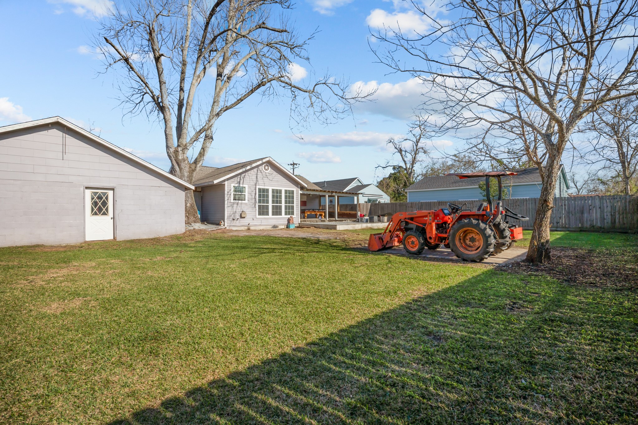 2006 Main Street Danbury, TX 77534 - Photo 30 of 30 a front view of a house with garden