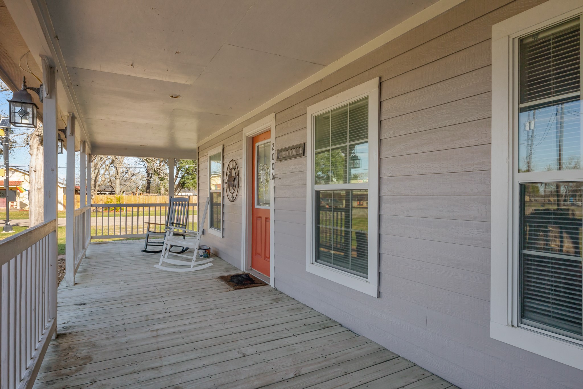 2006 Main Street Danbury, TX 77534 - Photo 5 of 30 a view of outdoor space with wooden floor and windows