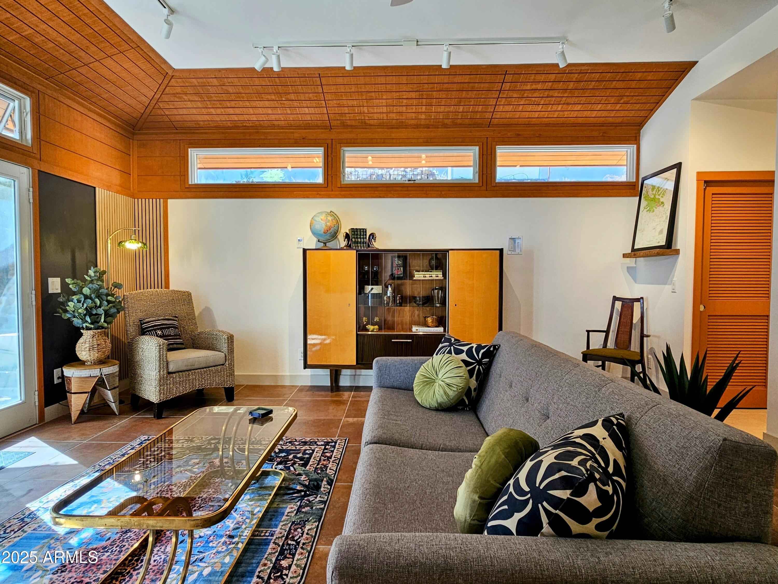210 Opera Drive Bisbee, AZ 85603 - Photo 3 of 36 a living room with furniture and wooden floor