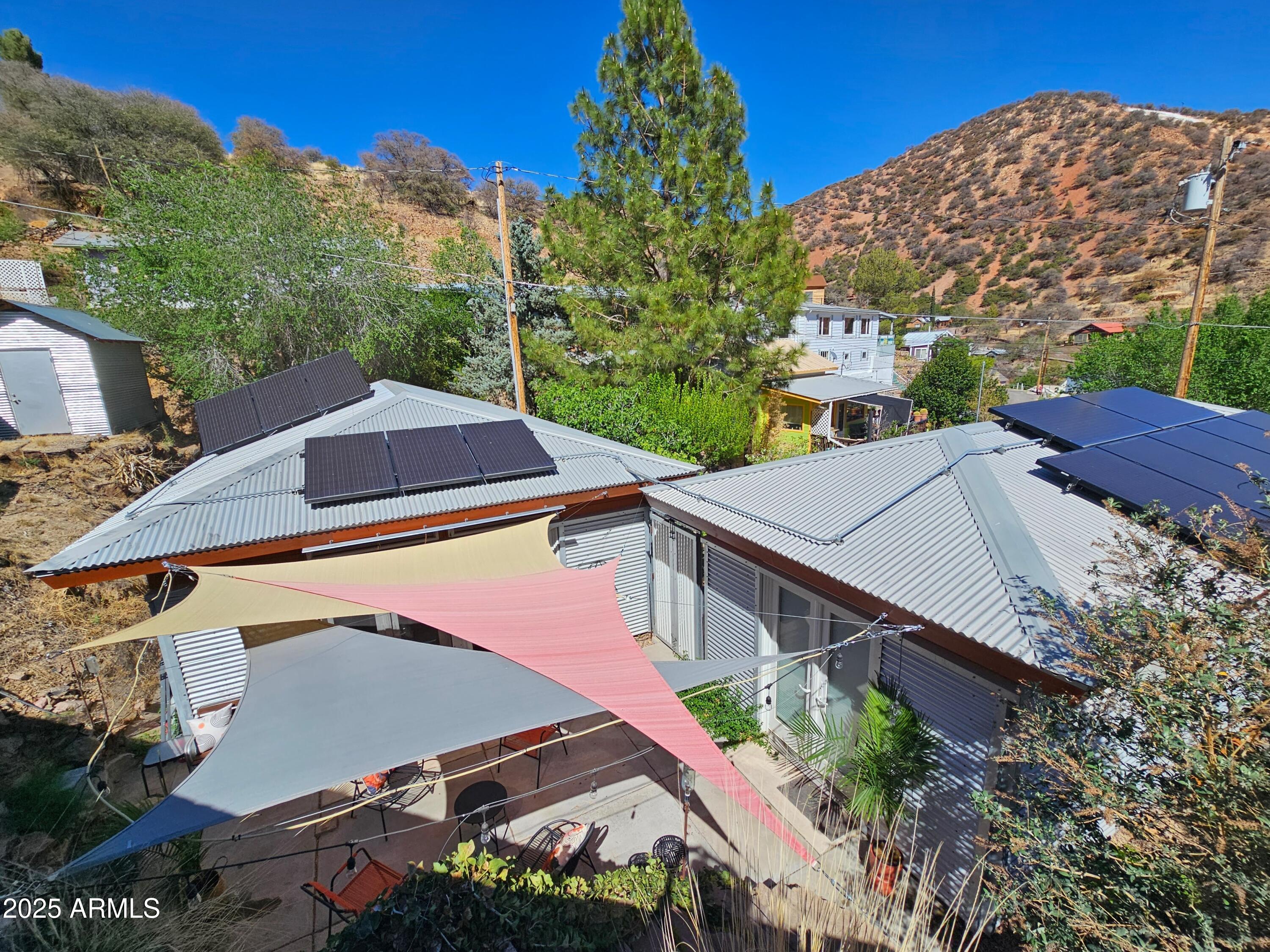 210 Opera Drive Bisbee, AZ 85603 - Photo 33 of 36 an aerial view of a house with a yard