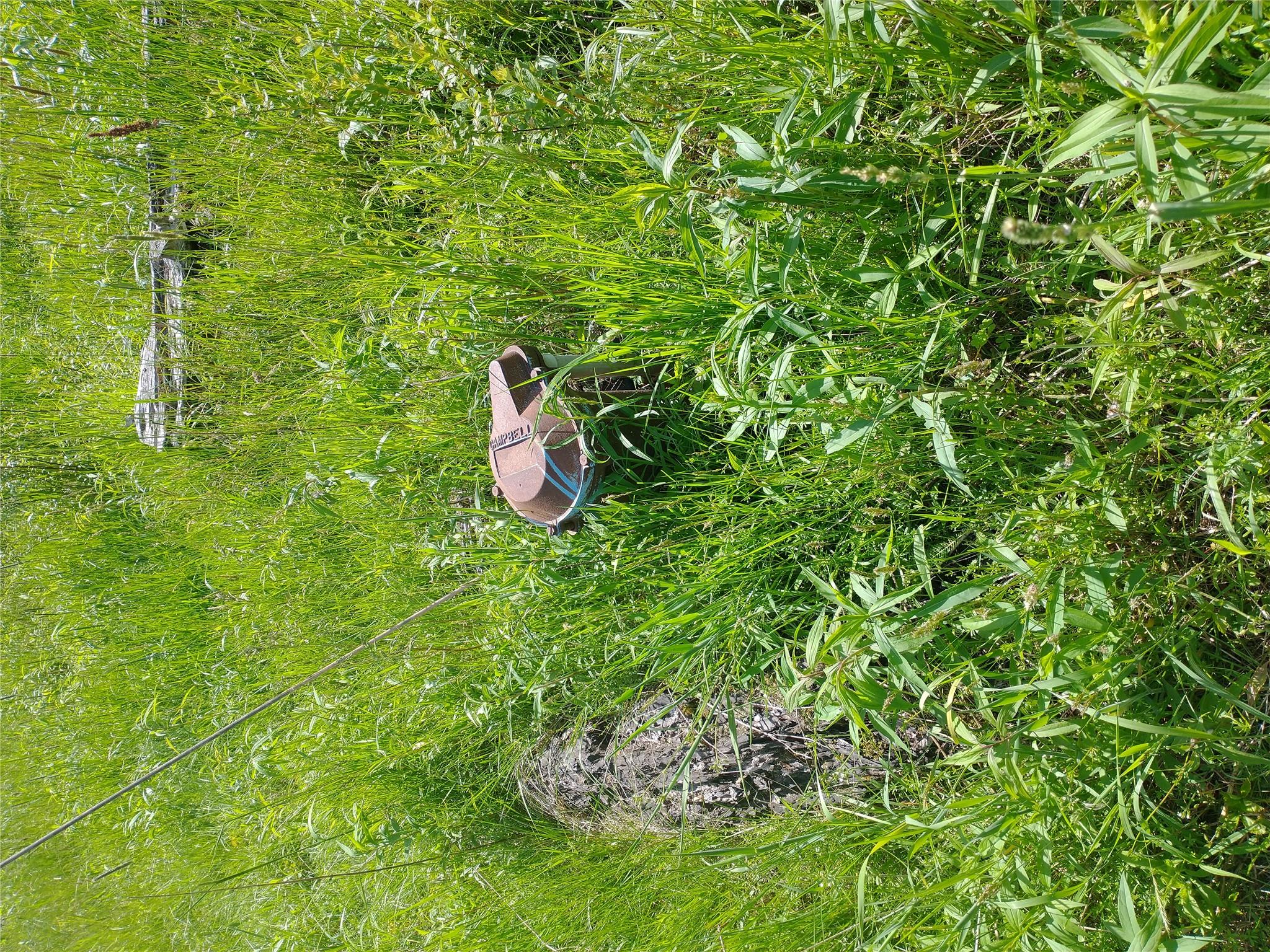 650 Thunder Hill Road Neversink, NY 12788 - Photo 34 of 37 a backyard of a house with a table and chair