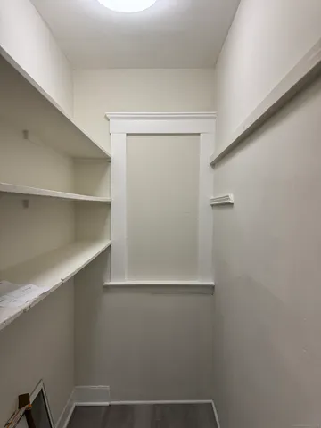 a view of small space with racks on the wall