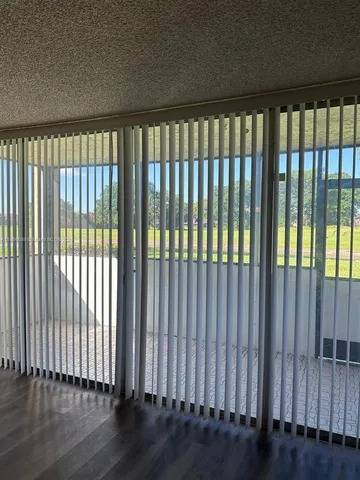 a view of a black and white floor to ceiling window