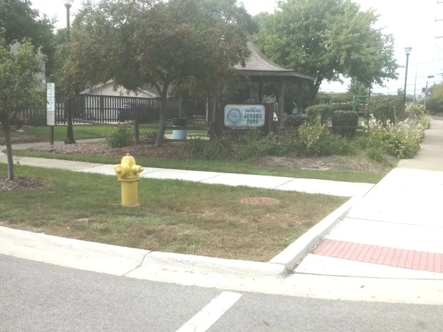 a view of a fountain in front of a house