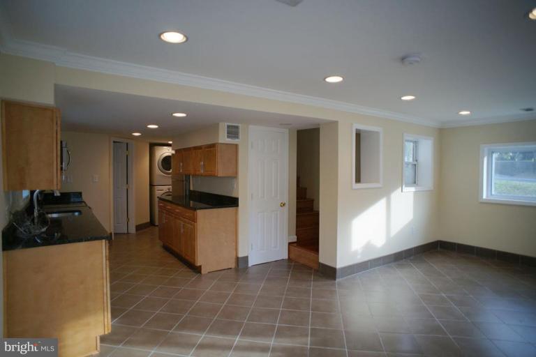 9723 Capitol View Avenue Silver Spring, MD 20910 - Photo 20 of 26 Finished Lower Level, with Family Room off the Kit