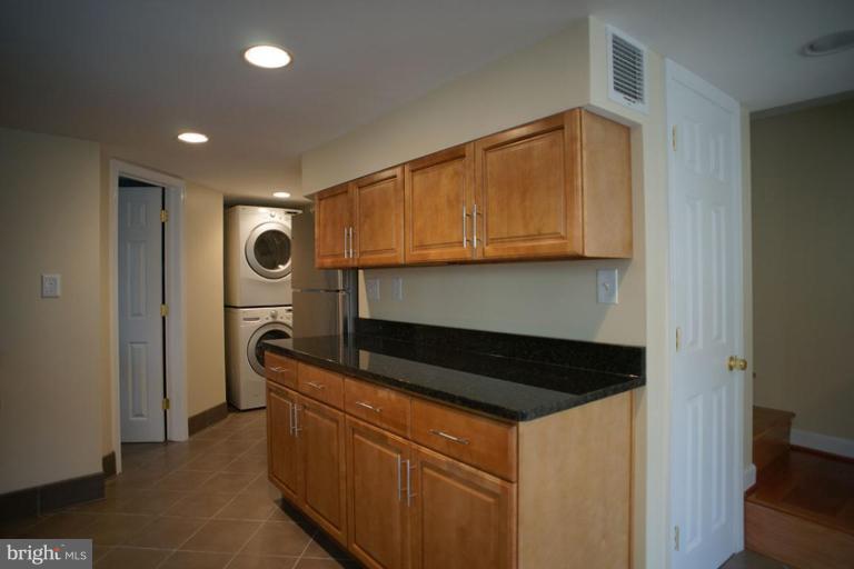9723 Capitol View Avenue Silver Spring, MD 20910 - Photo 4 of 26 Washer and Dryer right next to the kitchen