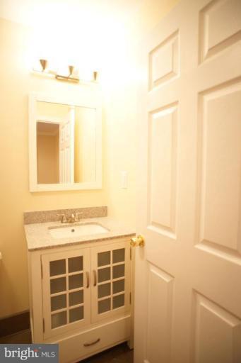 9723 Capitol View Avenue Silver Spring, MD 20910 - Photo 10 of 26 Upper Level Full Bath Vanity