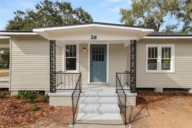a view of a house with a patio