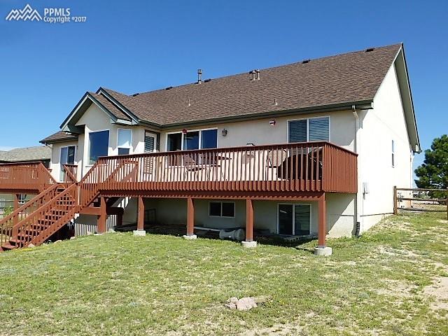 9456 Rockingham Drive Peyton, CO 80831 - Photo 1 of 7 2 Decks, Walk Out Basement, RV Parking