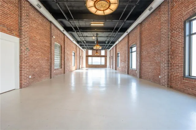 a living room with fireplace furniture and a flat screen tv