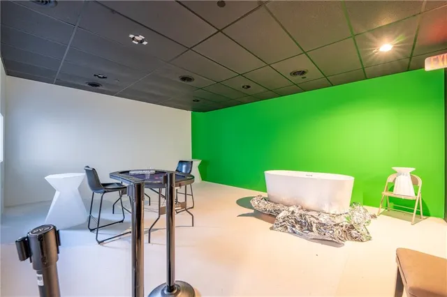 an aerial view of a house with mountain view